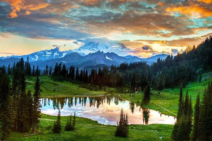 Sunset view over a lake reflecting Mount Rainier